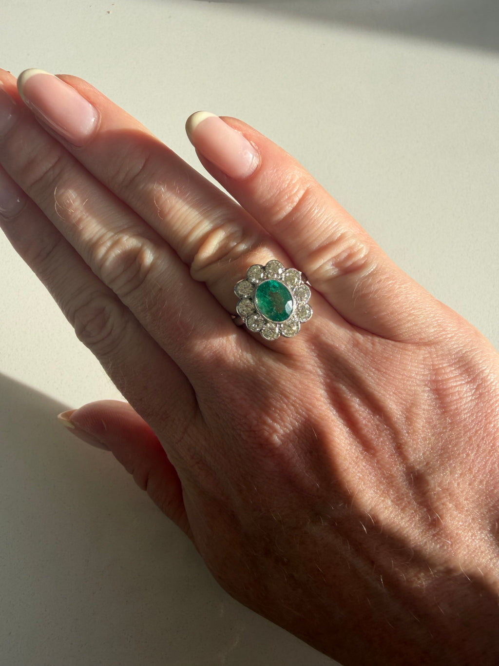 Platinum Diamond and Emerald Cluster Ring