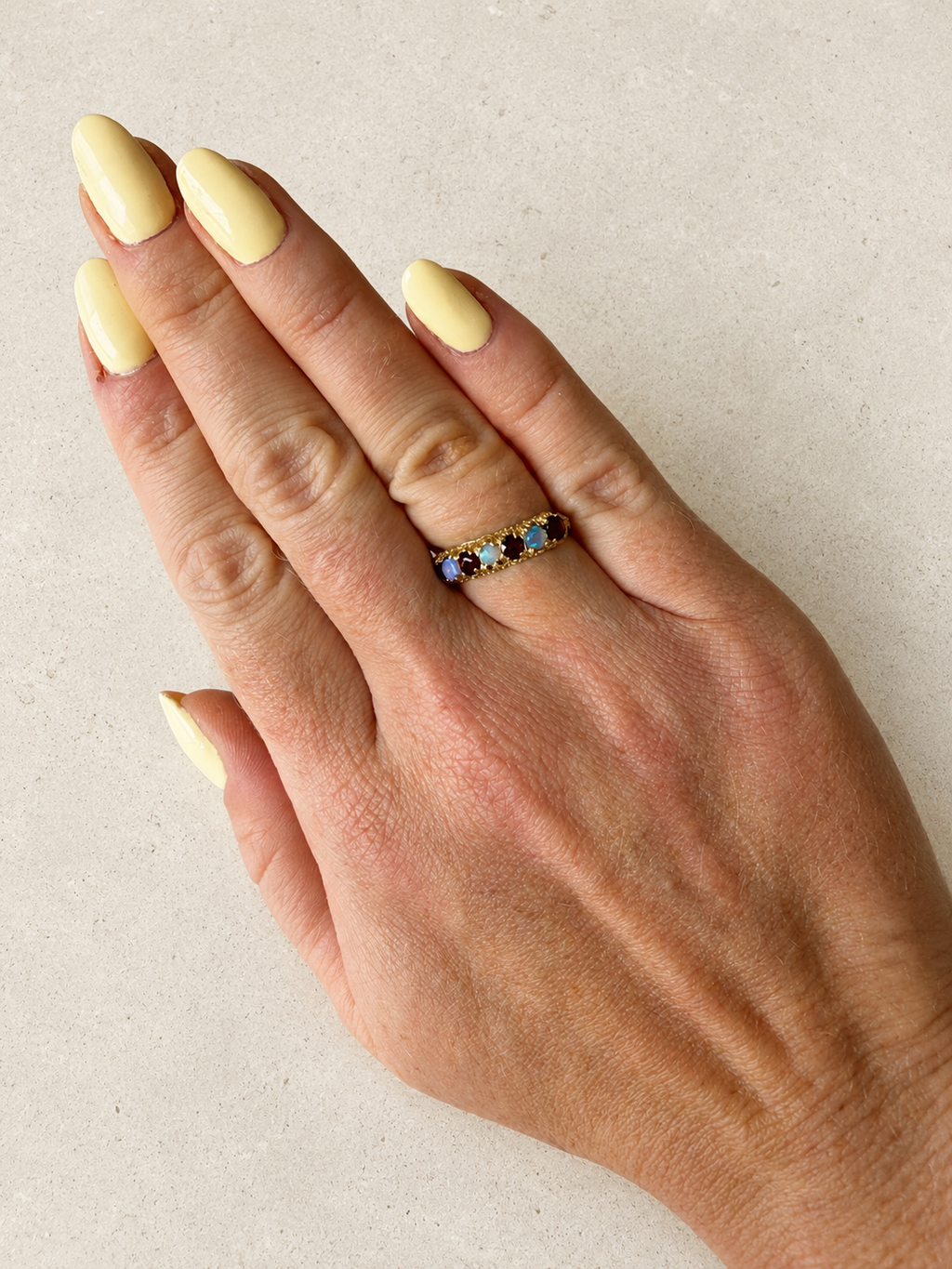 9ct Yellow Gold Opal and Garnet 7 Stone Ring