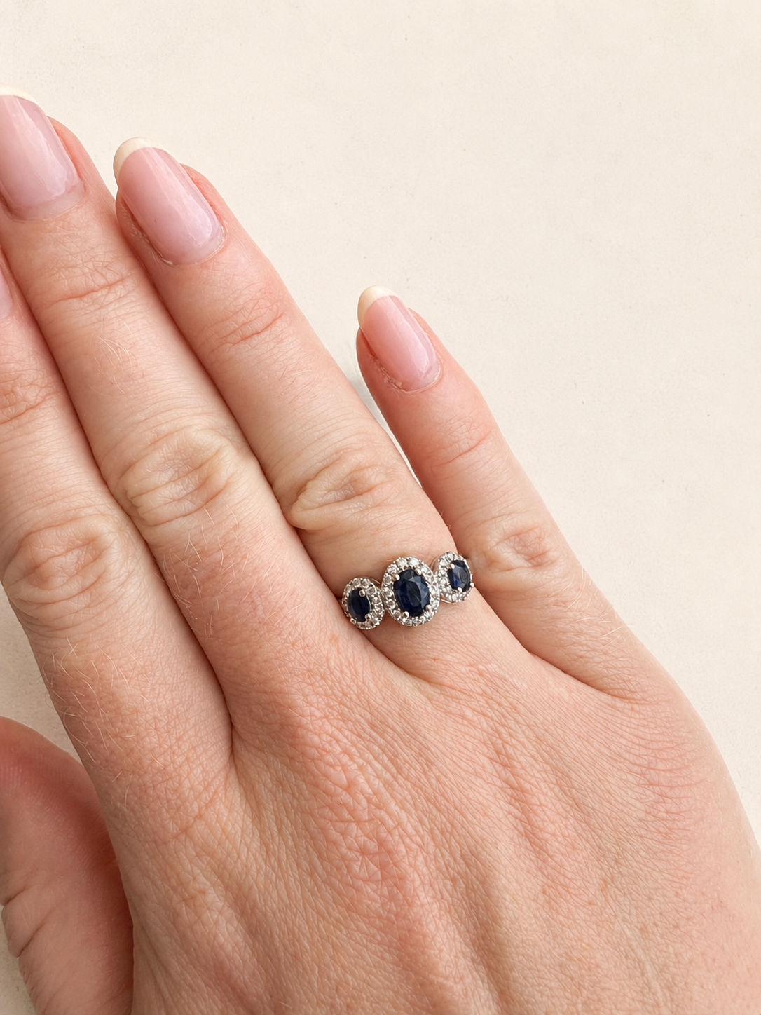 18ct White Gold Diamond and Triple Sapphire Halo Ring