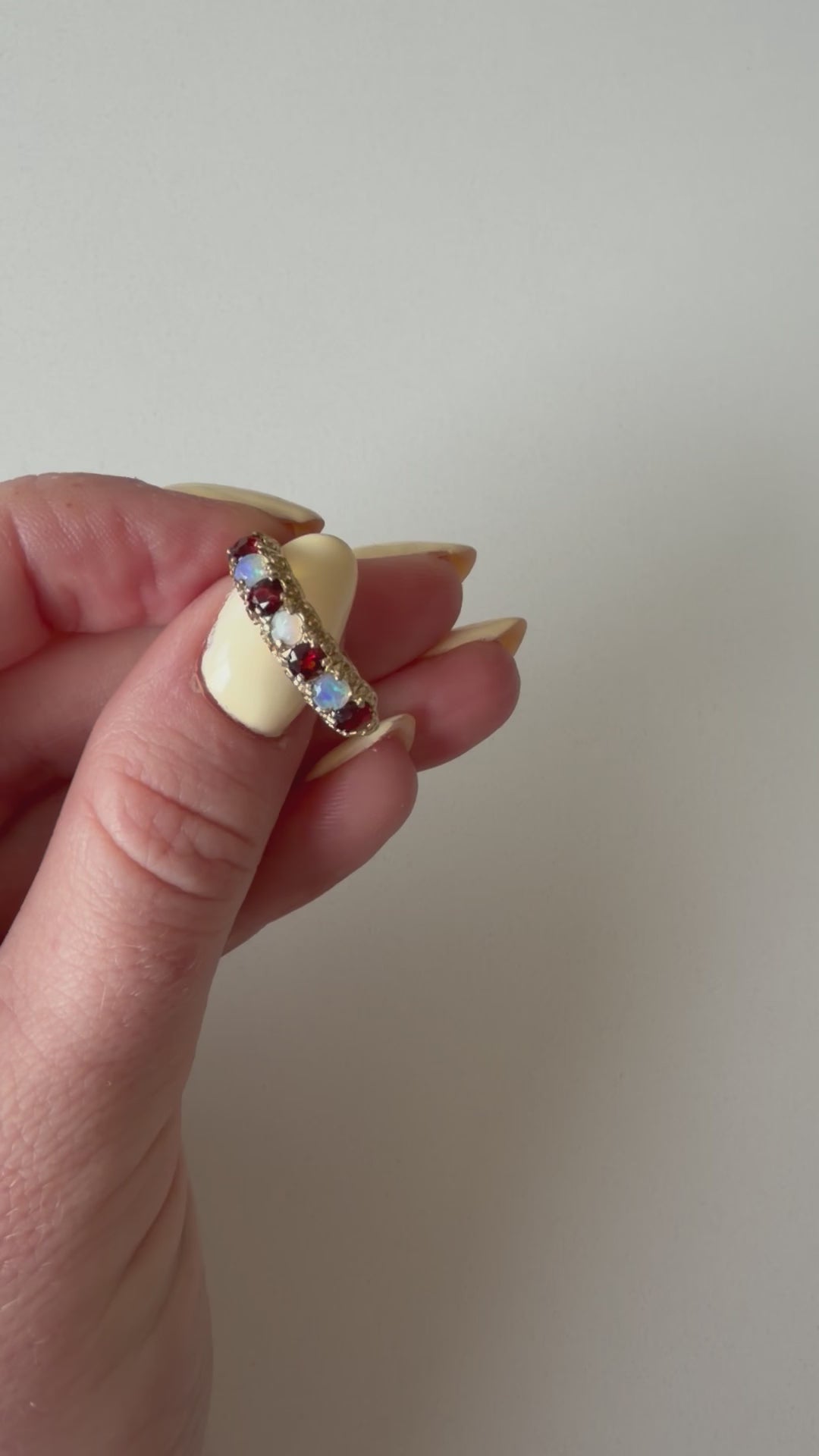 9ct Yellow Gold Opal and Garnet 7 Stone Ring